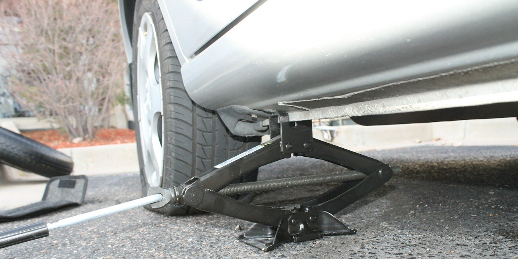 A car breaks down on the side of the road.