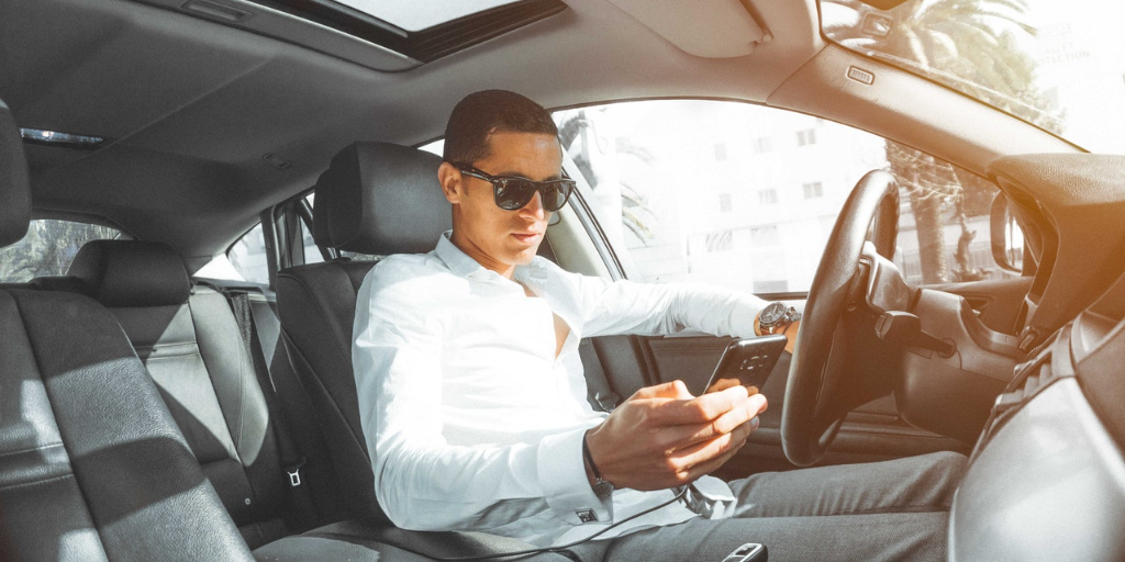 The driver has a close call while texting and driving