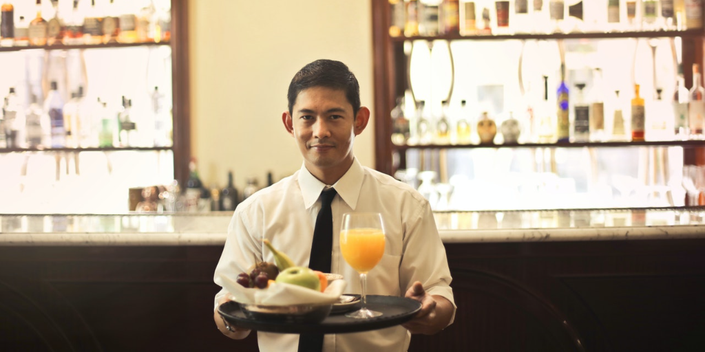 He works at a restaurant to make a living