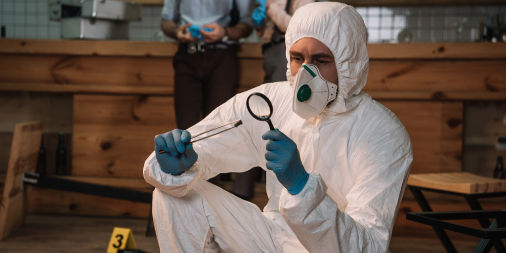 A investigator examines evidence at a crime scene.