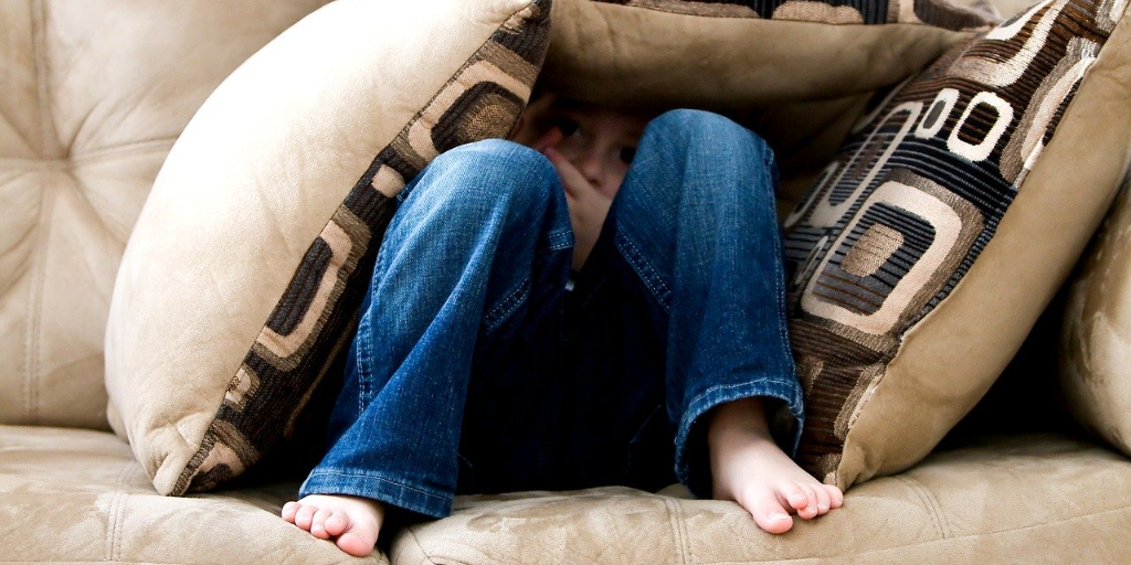 The boy felt like he was living in his older brother's shadow