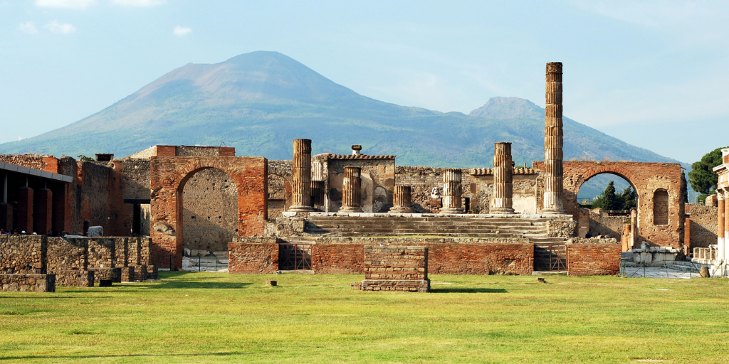 View of the Pompeii ruins in Italy with Mount Vesuvius in background